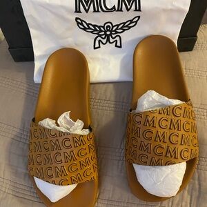 MCM Brown Logo Slides